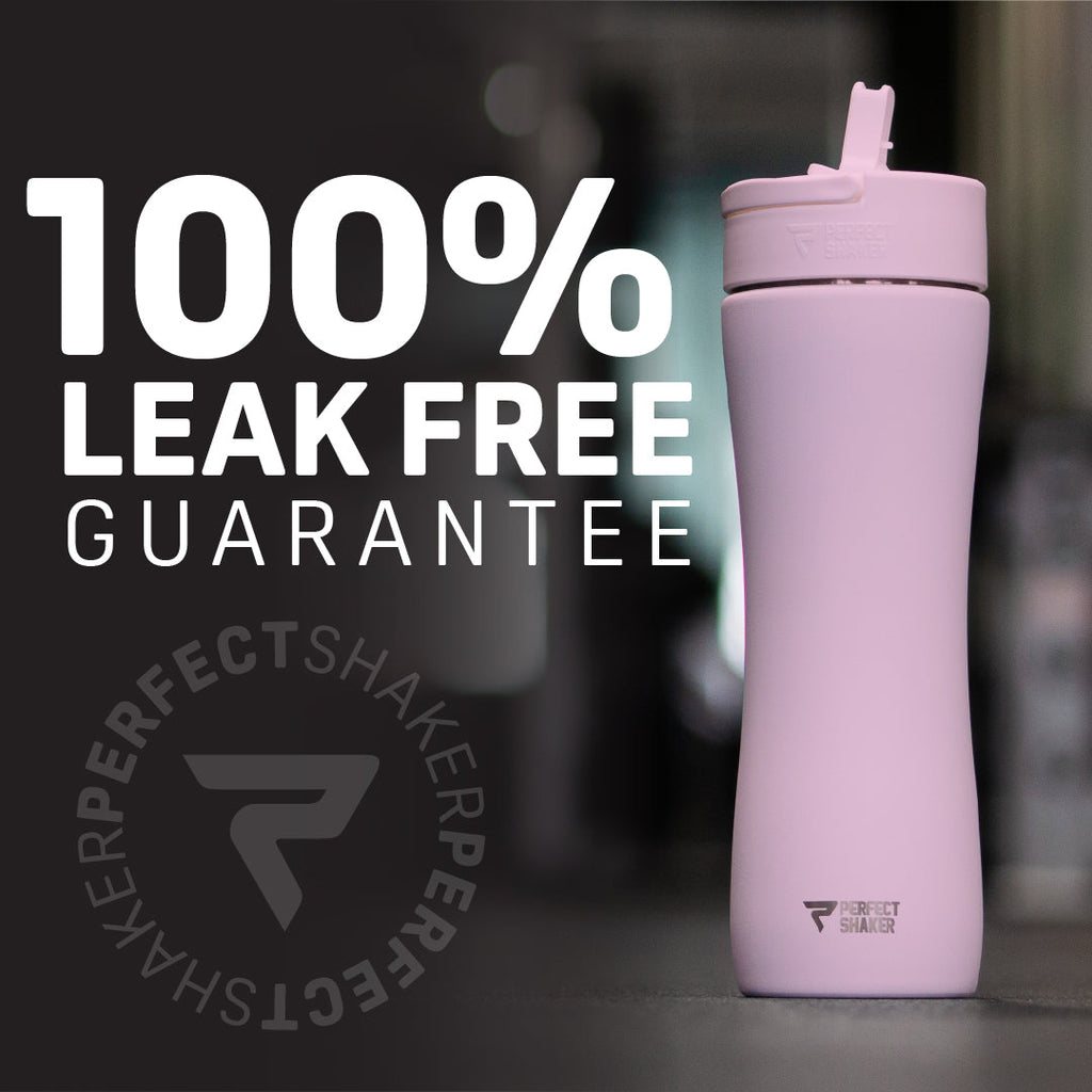 A light pink Perfect Shaker insulated shaker bottle with a flip-top lid, shown next to large white text reading '100% LEAK FREE GUARANTEE' on a dark blurred background.