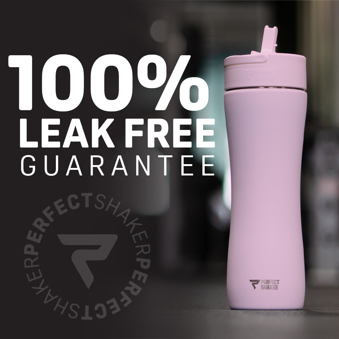 A light pink Perfect Shaker insulated shaker bottle with a flip-top lid, shown next to large white text reading '100% LEAK FREE GUARANTEE' on a dark blurred background.