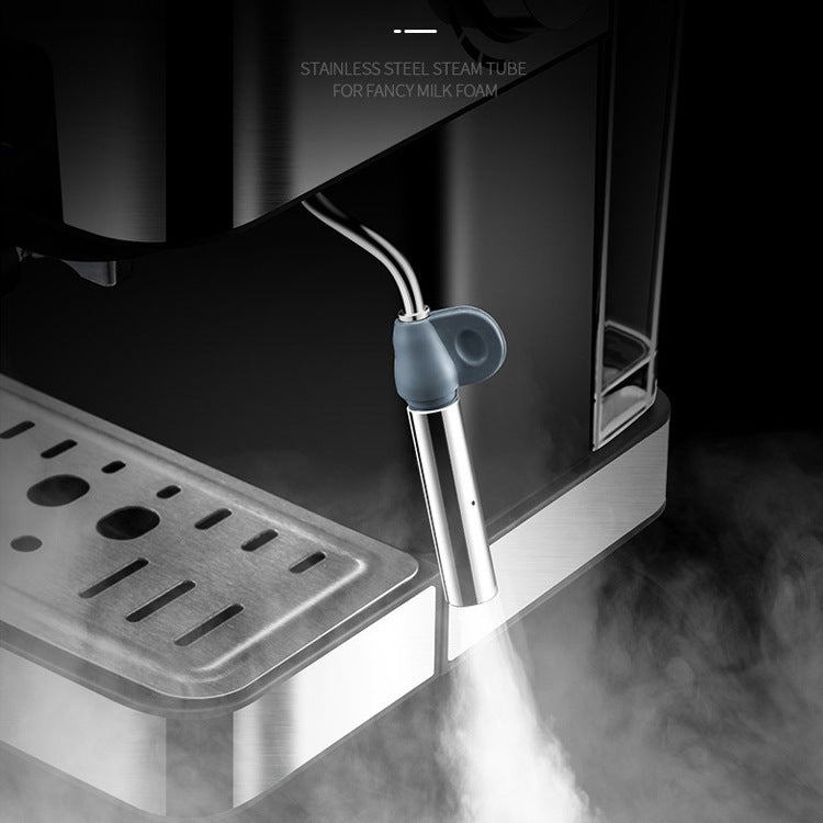 Stainless steel steam wand dispensing steam on a smart home espresso machine for milk frothing and creating café-style lattes and cappuccinos.