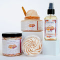 Duma Mbili Cinnamon Bun skincare gift bundle featuring whipped body butter, foaming sugar scrub, nourishing body oil and cinnamon stick, vegan cruelty-free self care set on white background, fall spa gift collection