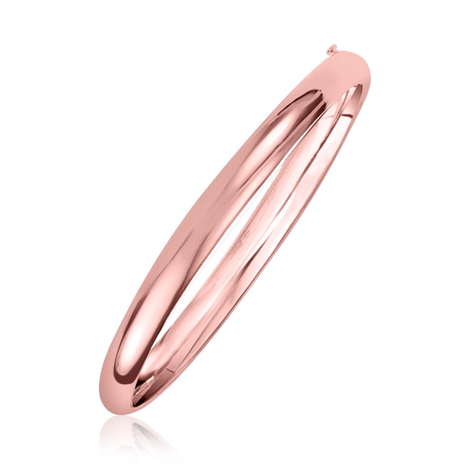Rose gold bangle on a white background. 14k Rose Gold Fancy Shiny Dome Bangle (5.00 mm)