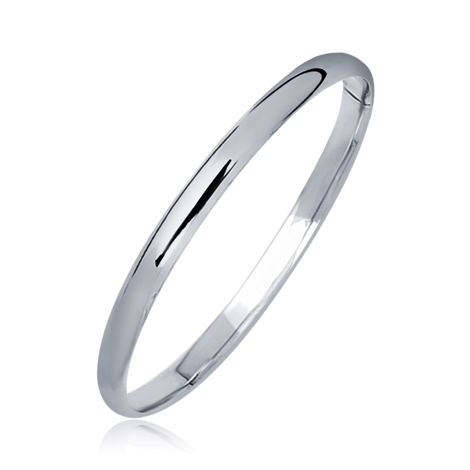 Silver ring on a white background. 14k White Gold Dome Childrens Bangle with a Polished Finish (5.50 mm)