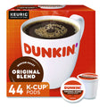Dunkin' Donuts K-Cup coffee pods packaging with a cup of coffee on an orange background.