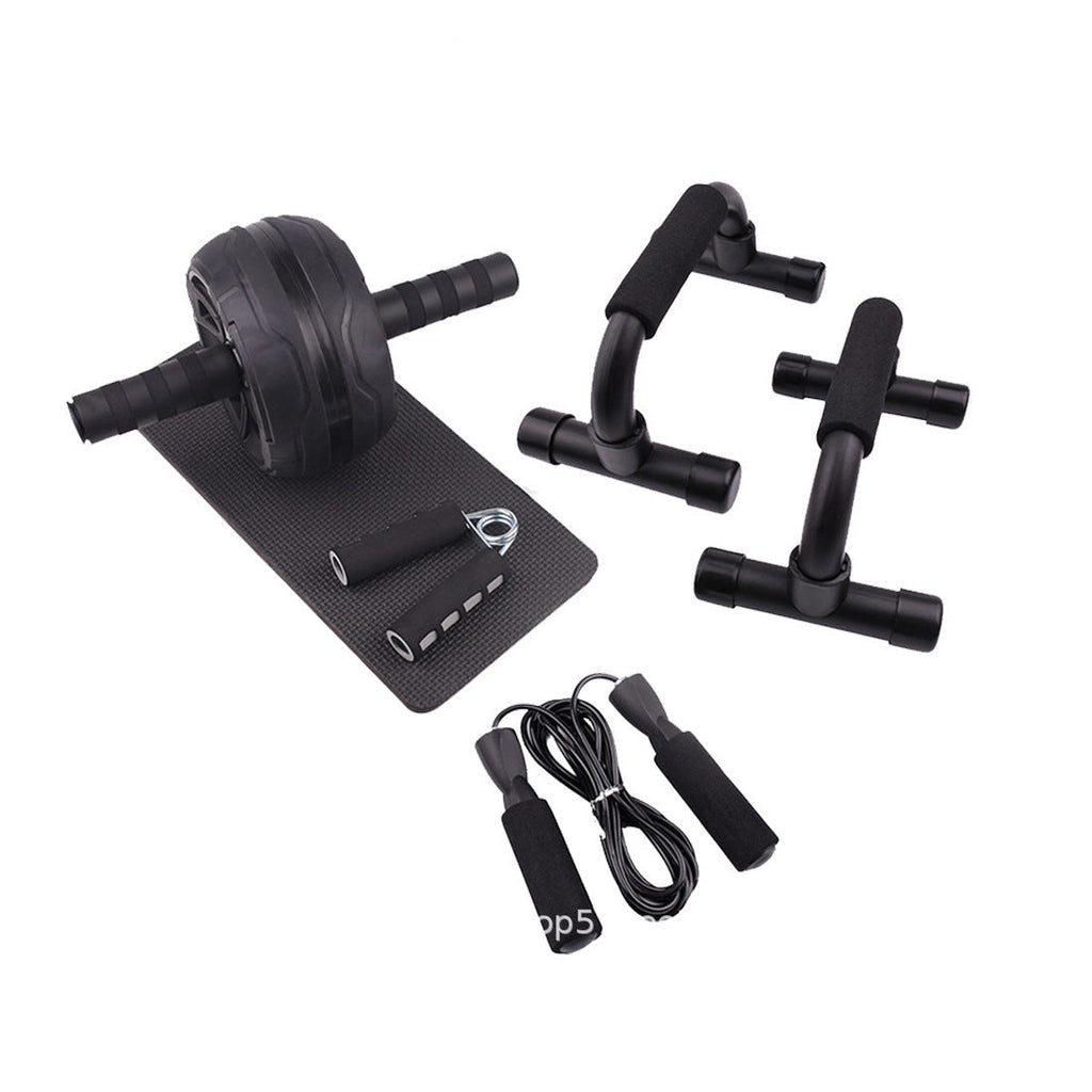 Set of black fitness equipment including an ab roller, push-up bars, and jump rope on a white background.