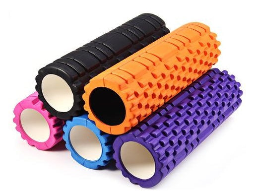 Set of foam rollers in black, orange, purple, and pink on a white background