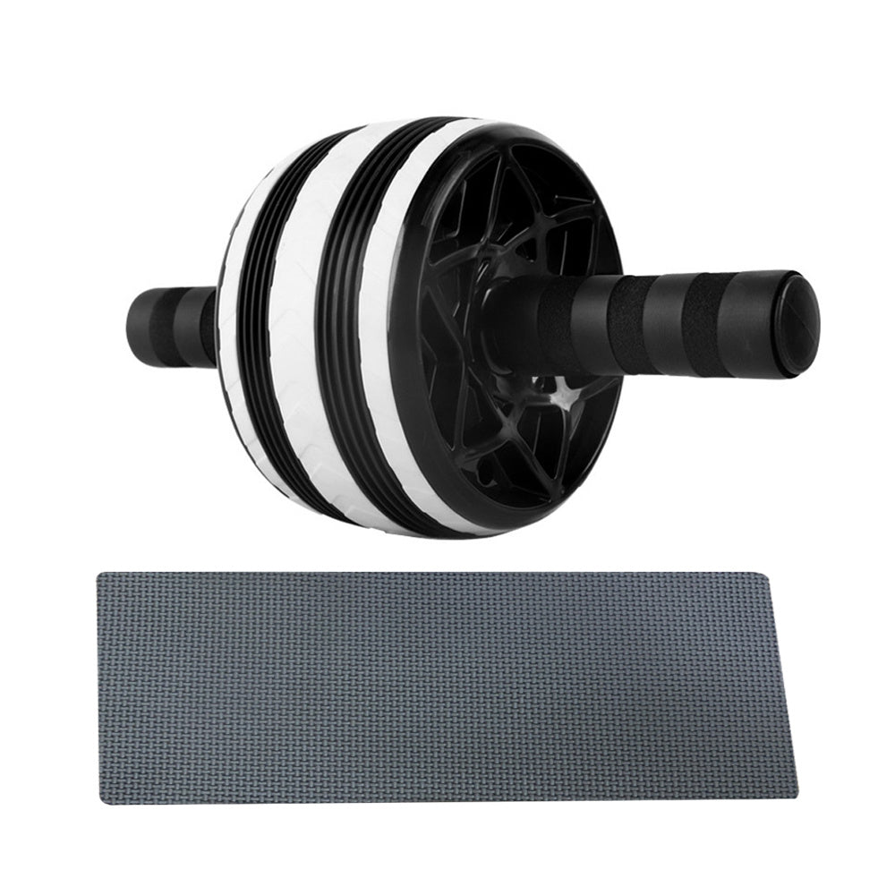 Black and white ab roller with a gray mat on a white background