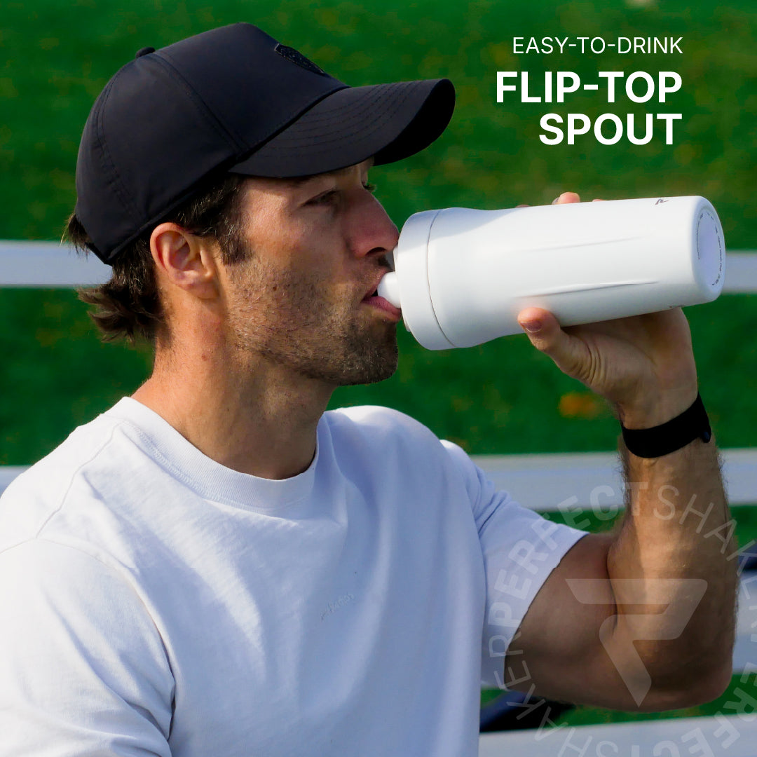 A man in a black baseball cap and white t-shirt drinking from a white flip-top spout bottle, with text overlay reading 'EASY-TO-DRINK FLIP-TOP SPOUT'.