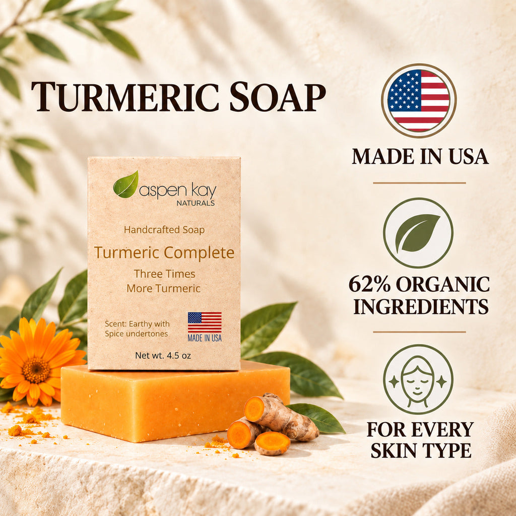 Aspen Kay Naturals Turmeric Complete handcrafted soap bar displayed on a textured cream fabric with turmeric root, turmeric powder, and decorative leaves. The image includes text overlays highlighting 'Turmeric Soap', 'Made in USA', '62% Organic Ingredients', and 'For every skin type'.