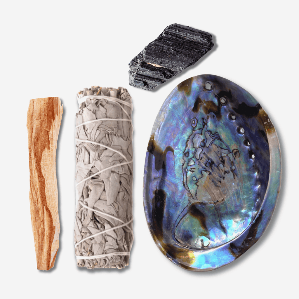 Protection Ritual Set with white sage smudge stick, palo santo, black tourmaline crystal and abalone shell for spiritual cleansing, energy clearing and meditation.