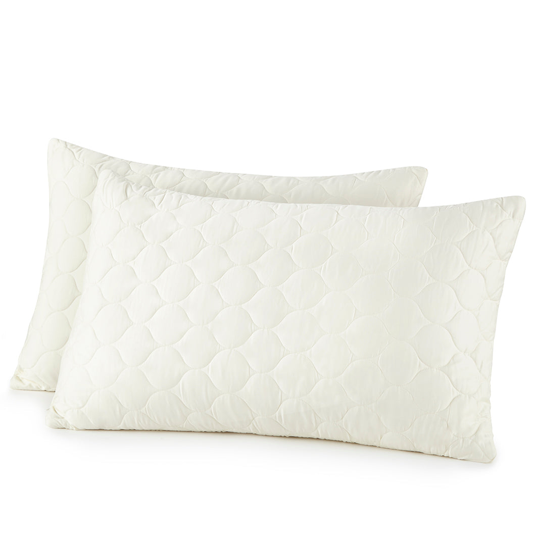 Two quilted pillows on a white background. Organic Cotton Quilted Pillow Protectors