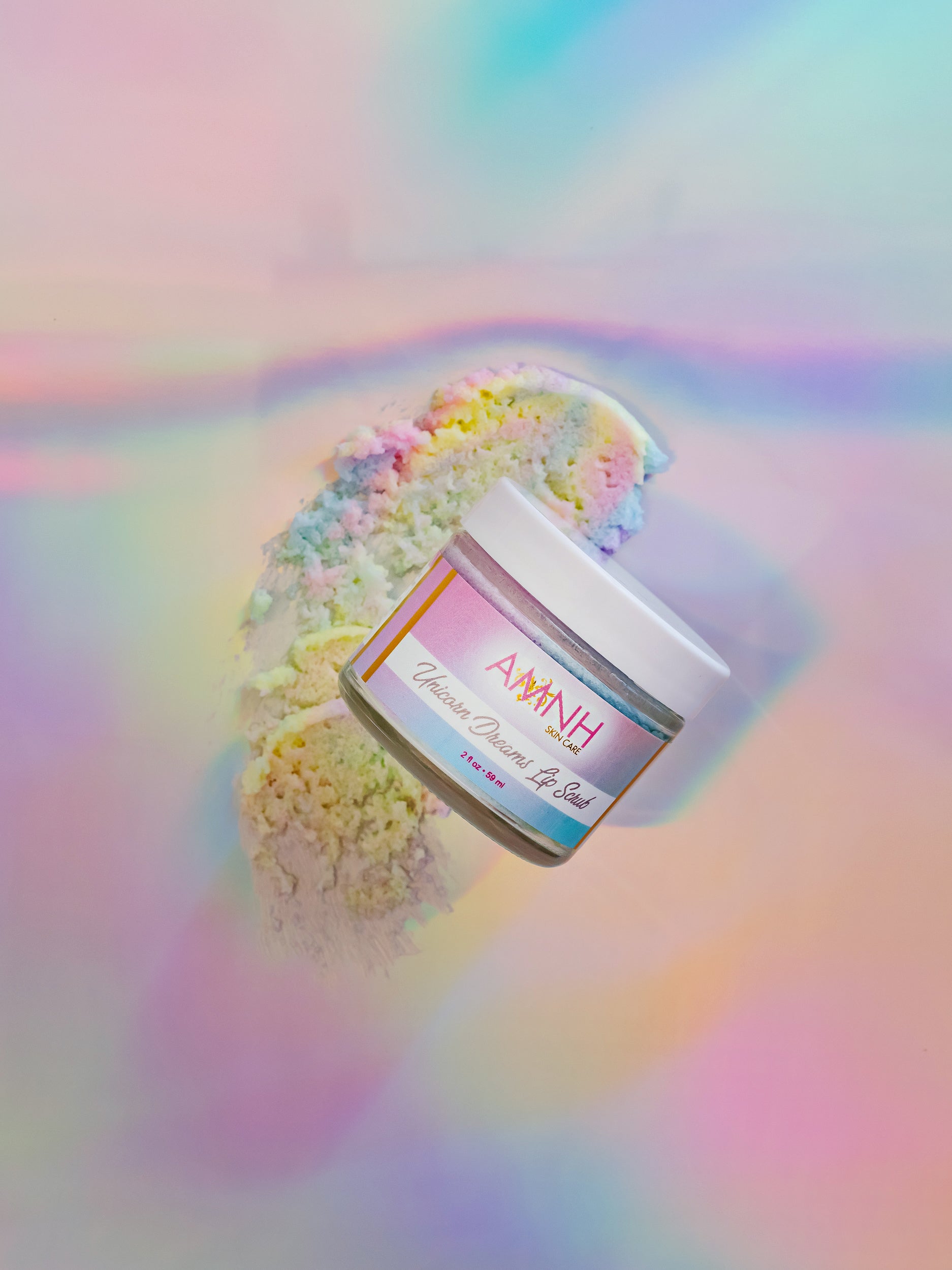 "Unicorn Dreams" Lip Scrub-"Unicorn Dreams" Lip Scrub in glass jar with rainbow sugar scrub on iridescent background, vegan clean beauty lip exfoliator made with natural ingredients, cruelty-free skincare by a female-owned brand.