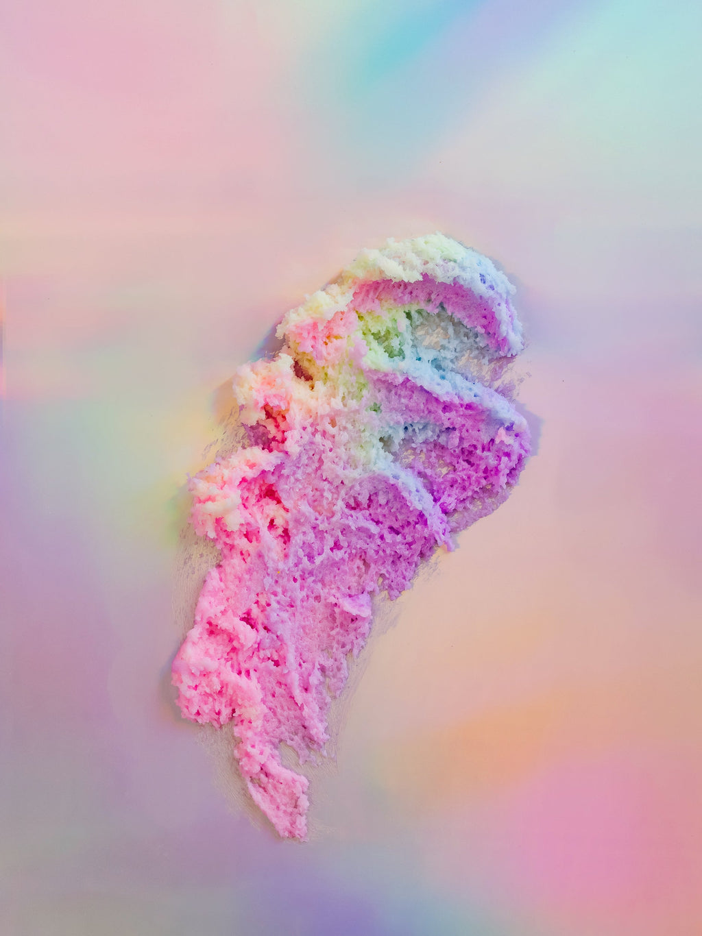 "Unicorn Dreams" Sugar Scrub texture with shimmering pastel colors, whipped exfoliating body scrub made with natural ingredients including shea butter, mango butter, coconut oil, cocoa butter, aloe vera, jojoba oil, vitamin E, and sugar for gentle exfoliation and deep hydration. Clean beauty, cruelty-free, vegan skincare from a female-owned brand.