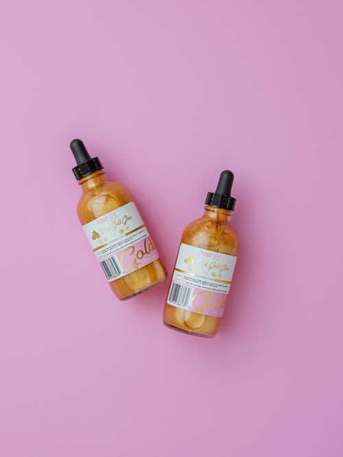 24K Gold Glow Body Oil duo from the 24K Gold Bundle featuring clean beauty, cruelty-free, vegan skincare made with natural ingredients from a female-owned brand for radiant, glowing skin.