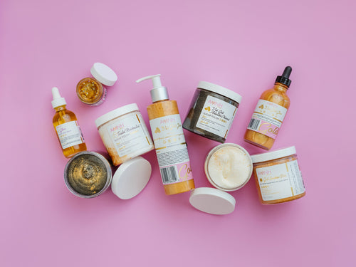 24K Gold Bundle clean beauty skincare collection featuring vegan, cruelty-free body scrub, glow lotion, body oil, and natural ingredient self-care essentials from a female-owned brand.