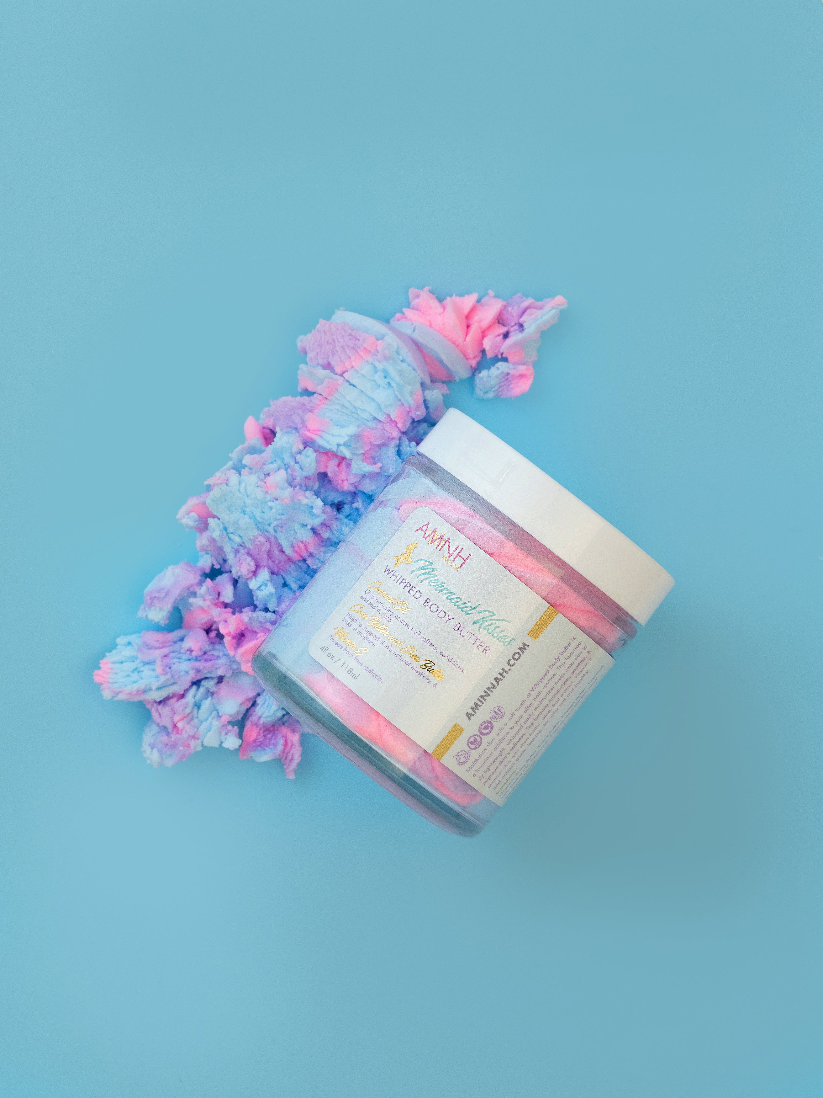 "Mermaid Kisses" Whipped Body Butter in a luxurious jar with whipped pink body butter, showcasing clean beauty skincare made with natural ingredients. Cruelty-free, vegan, paraben-free, gluten-free formula from a female-owned brand with recyclable packaging for soft, deeply moisturized, healthy-looking skin.