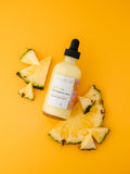 AMINNAH Fineapples Boob Serum with pineapple fruit extract, retinol, vitamin E, argan oil, jojoba oil, rosehip oil, aloe vera, and botanical oils for hydrating, nourishing, and smoothing skin. Vegan, cruelty-free clean beauty by a female-owned brand. This is a clean beauty, cruelty free, vegan, natural ingredients, female owned brand, clean beauty brand.

