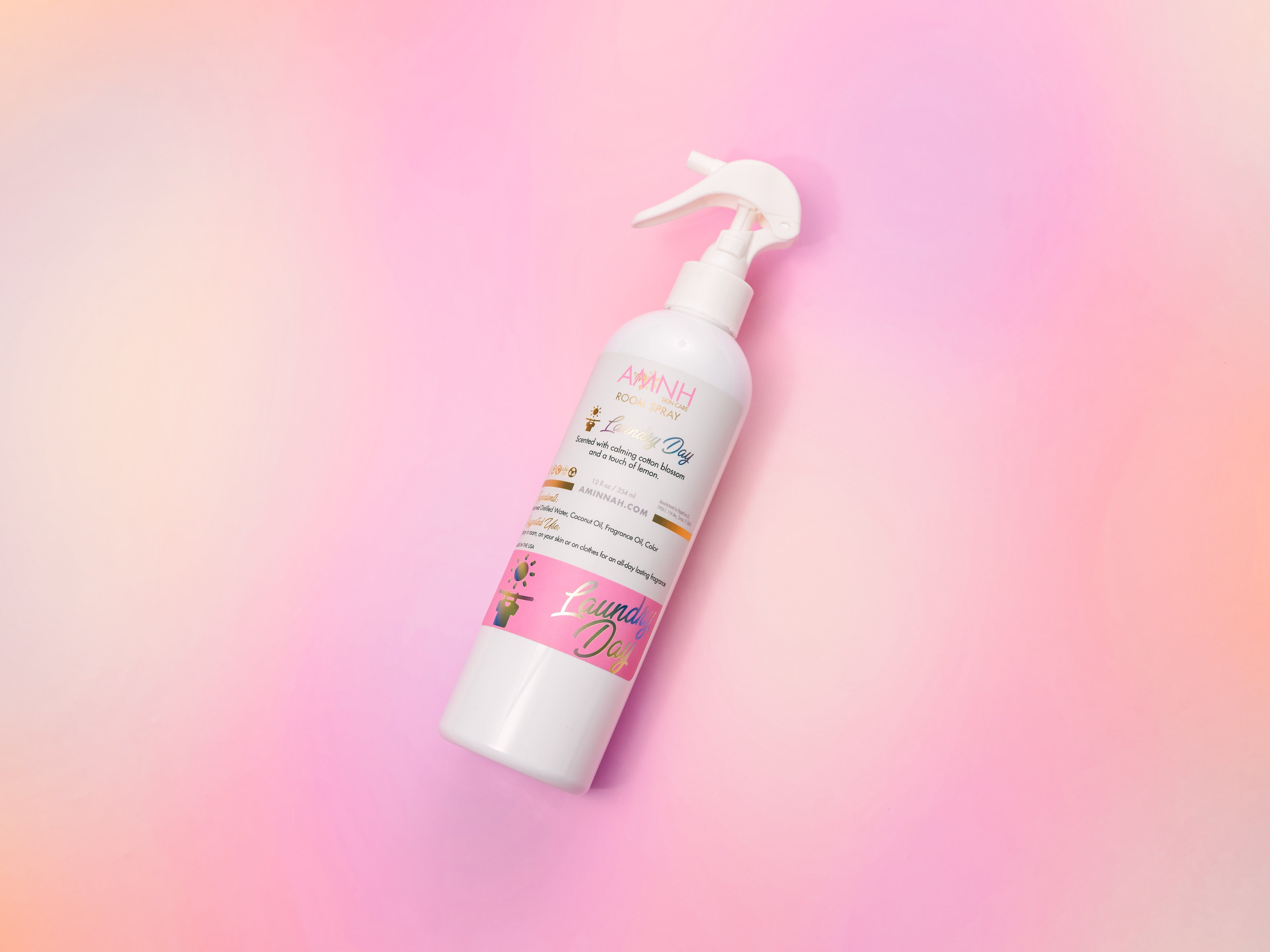 Laundry Day Room Spray by AMINNAH clean beauty in recyclable spray bottle with natural ingredients, alcohol-free formula, clean beauty, vegan, cruelty-free, paraben-free, gluten-free, female-owned brand, home fragrance spray for a fresh, clean-smelling room.