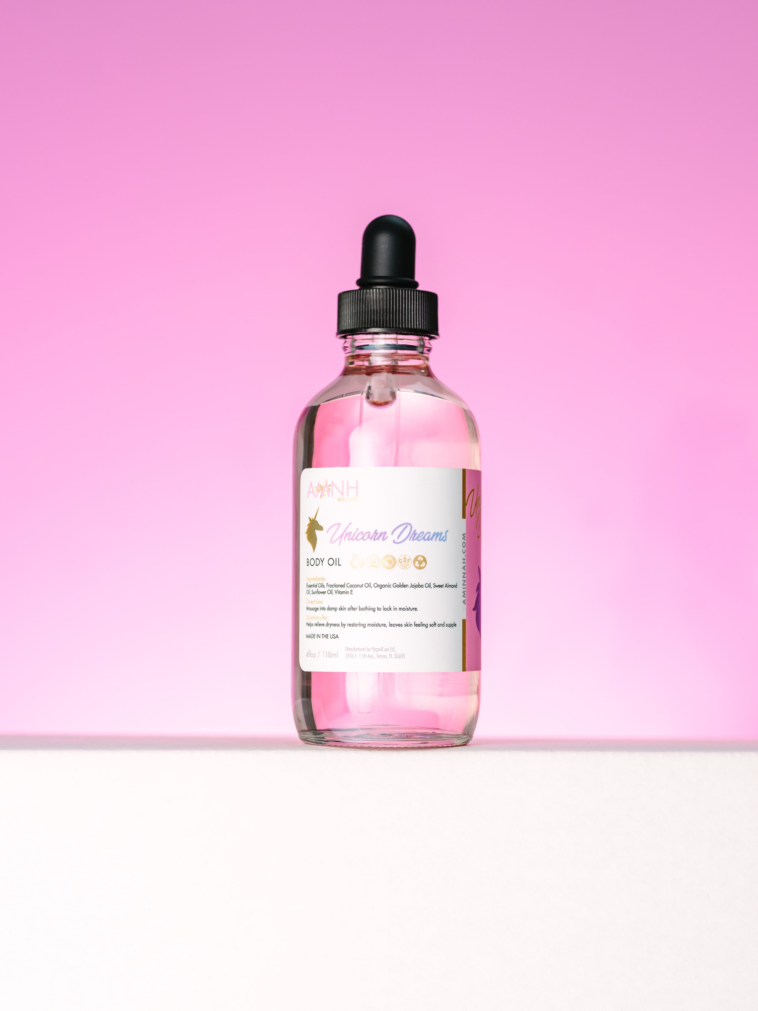 Unicorn Dreams Bundle featuring a luxurious body butter, sugar scrub, and nourishing body oil by AMINNAH. Clean beauty, cruelty-free, vegan skincare made with natural ingredients. Paraben-free, gluten-free, alcohol-free body care in recyclable packaging from a female-owned brand. Sweet Pink Sugar and Cotton Candy scented self-care gift set for soft, radiant, hydrated skin.