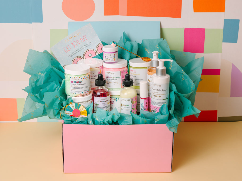 TikTok's #1 Mystery Box featuring 10 premium clean beauty essentials in a reusable gift box with recyclable packaging. Includes cruelty-free, vegan, paraben-free, gluten-free skincare and body care made with natural ingredients from a female-owned brand. Luxury self-care gift set with body butter, sugar scrub, body polish, body serum, and skincare essentials for all skin types.