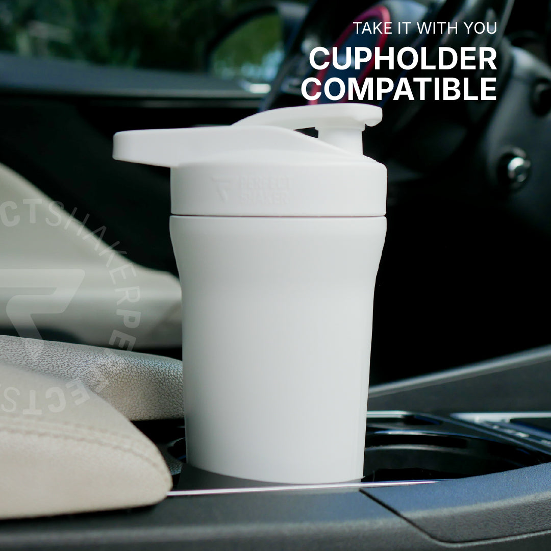 White tumbler with lid in a car cupholder, text 'Cupholder Compatible' displayed.