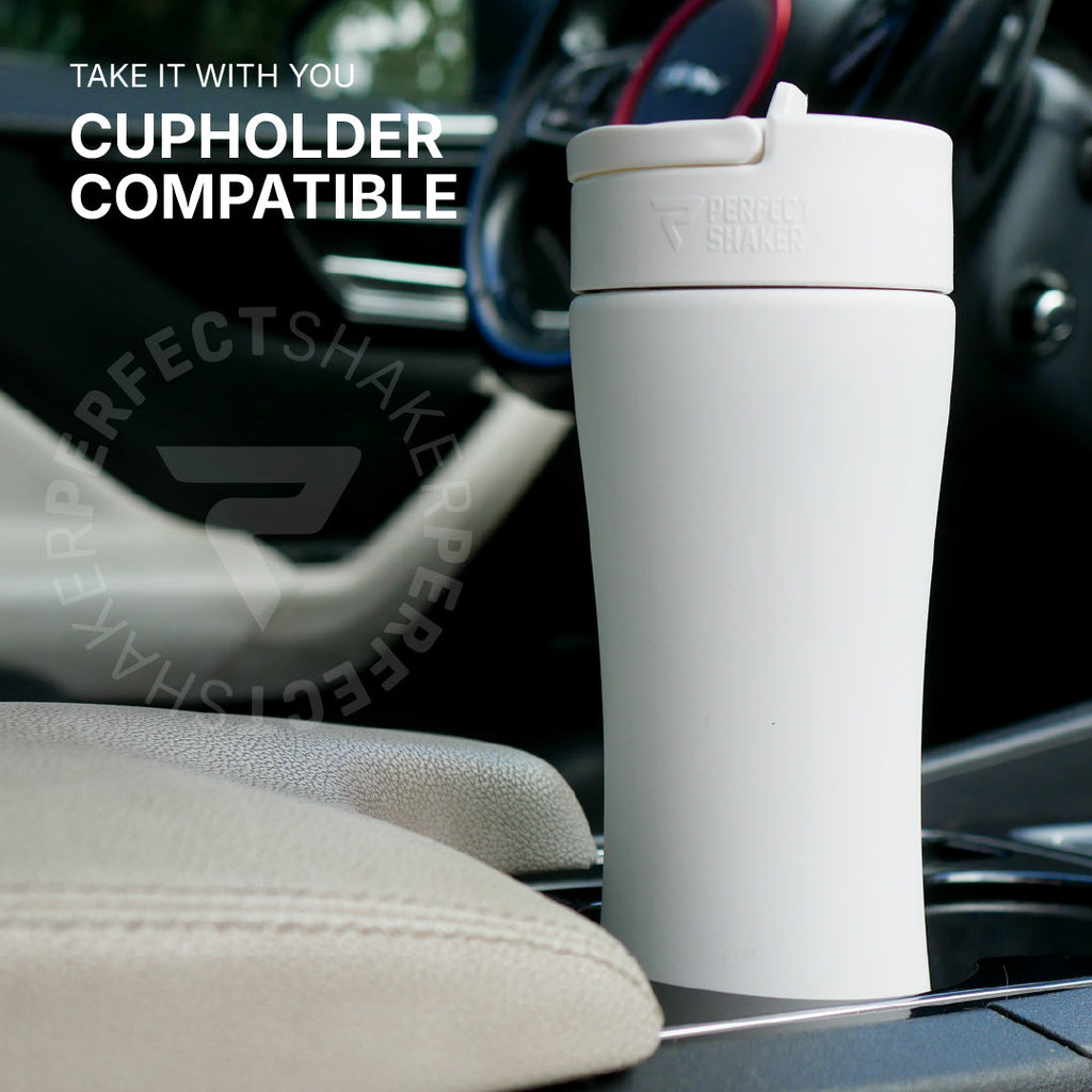 White PerfectShaker cup on a car cupholder with text 'Take it with you' and 'Cupholder Compatible'.