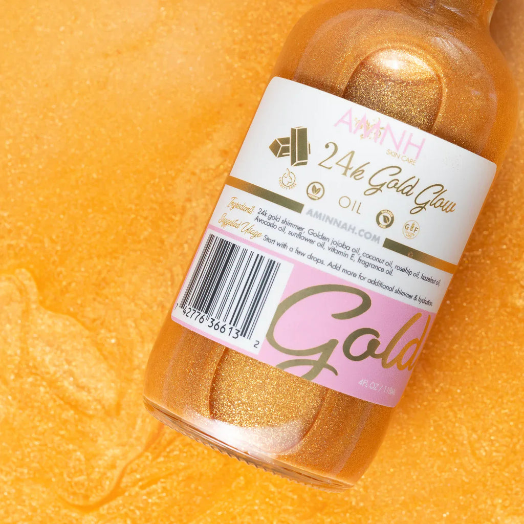 24K Gold Glow Body Oil bottle with shimmering golden body oil in a clear glass bottle against a radiant gold background. Made with natural ingredients to nourish, hydrate, and illuminate skin for a healthy-looking glow. Clean beauty, cruelty-free, vegan skincare from a female-owned brand, perfect for daily moisturizing and luminous, glowing skin.