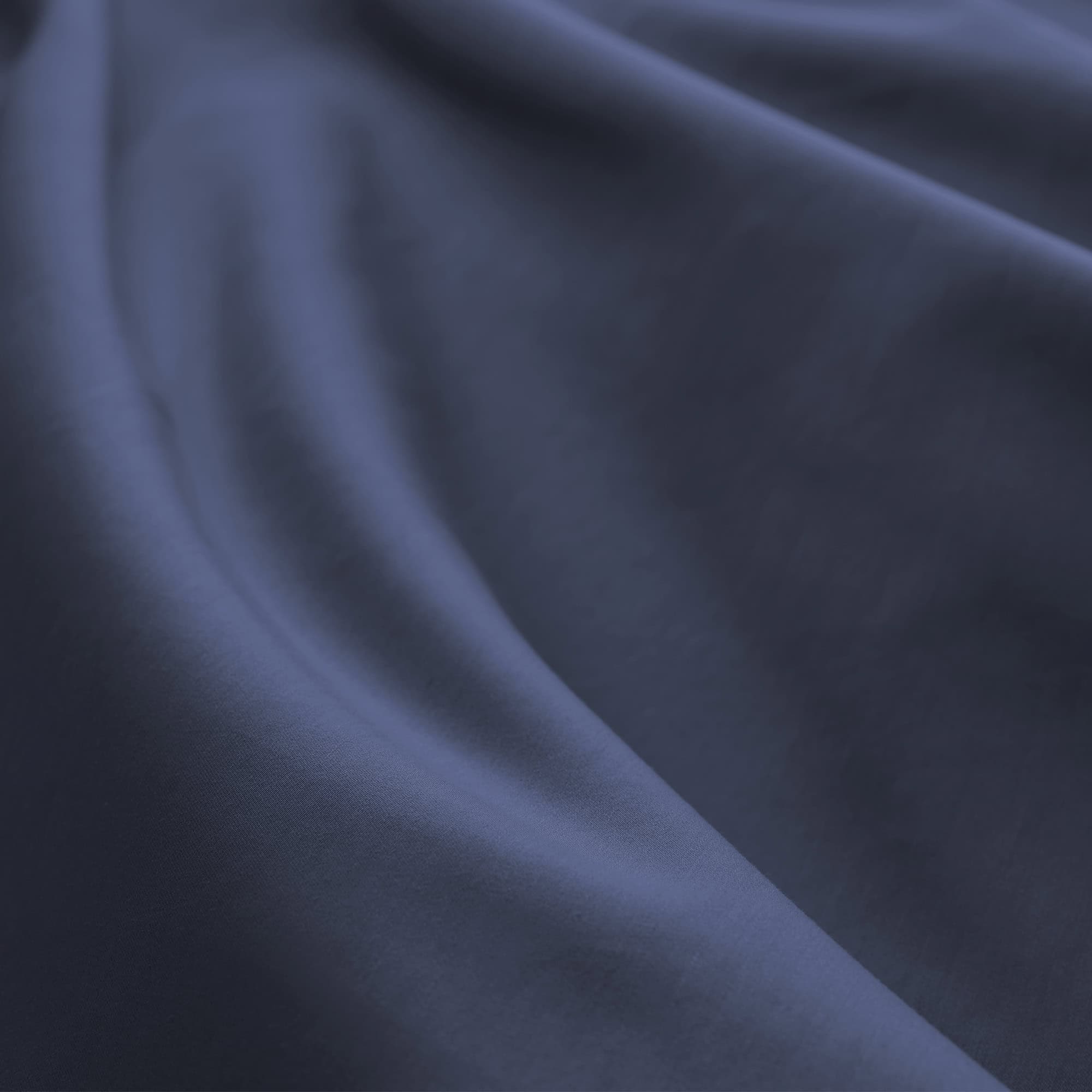 Close-up of dark blue fabric with a soft texture, 100% GOTS-Certified &amp; Fairtrade-Certified Organic Cotton
Made in India
High quality, dense 500-thread-count sateen weave becomes luxuriously soft with washing
Durable elastic band
Non-toxic, hypoallergenic, naturally breathable, and cooling
16" deep pocket, ideal for plush mattresses
Easy Care, Machine Wash and Tumble Dry