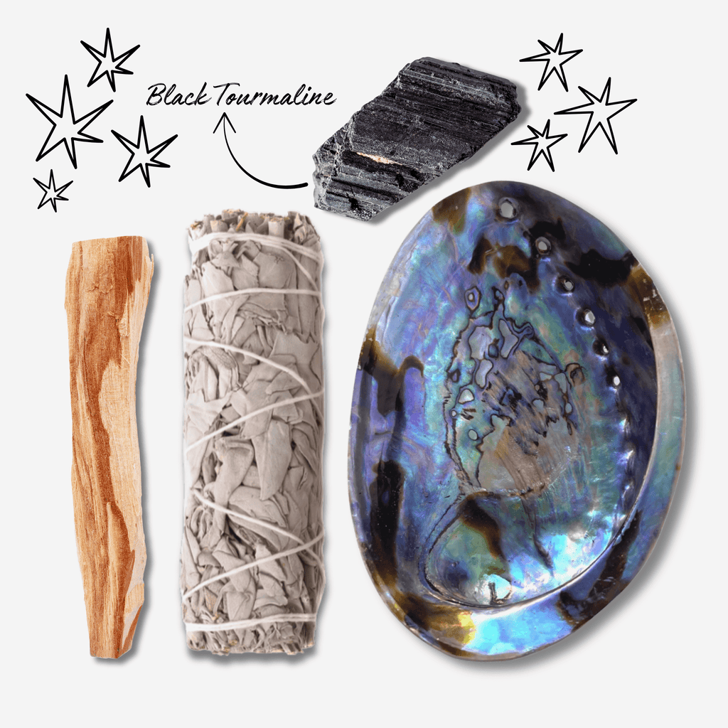Protection Ritual Set with black tourmaline crystal, white sage smudge bundle, palo santo stick and iridescent abalone shell for cleansing, grounding and spiritual protection.