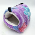 Colorful plush hanging hamster sleeping bag nest with ultra-soft fleece lining, cozy enclosed hideaway, and metal hanging hooks for hamsters, mice, gerbils, dwarf hamsters, and other small pets.