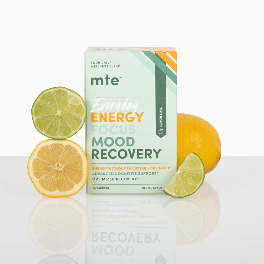 MTE Energy Plus Mood Recovery supplement box with lemons and limes on a reflective surface