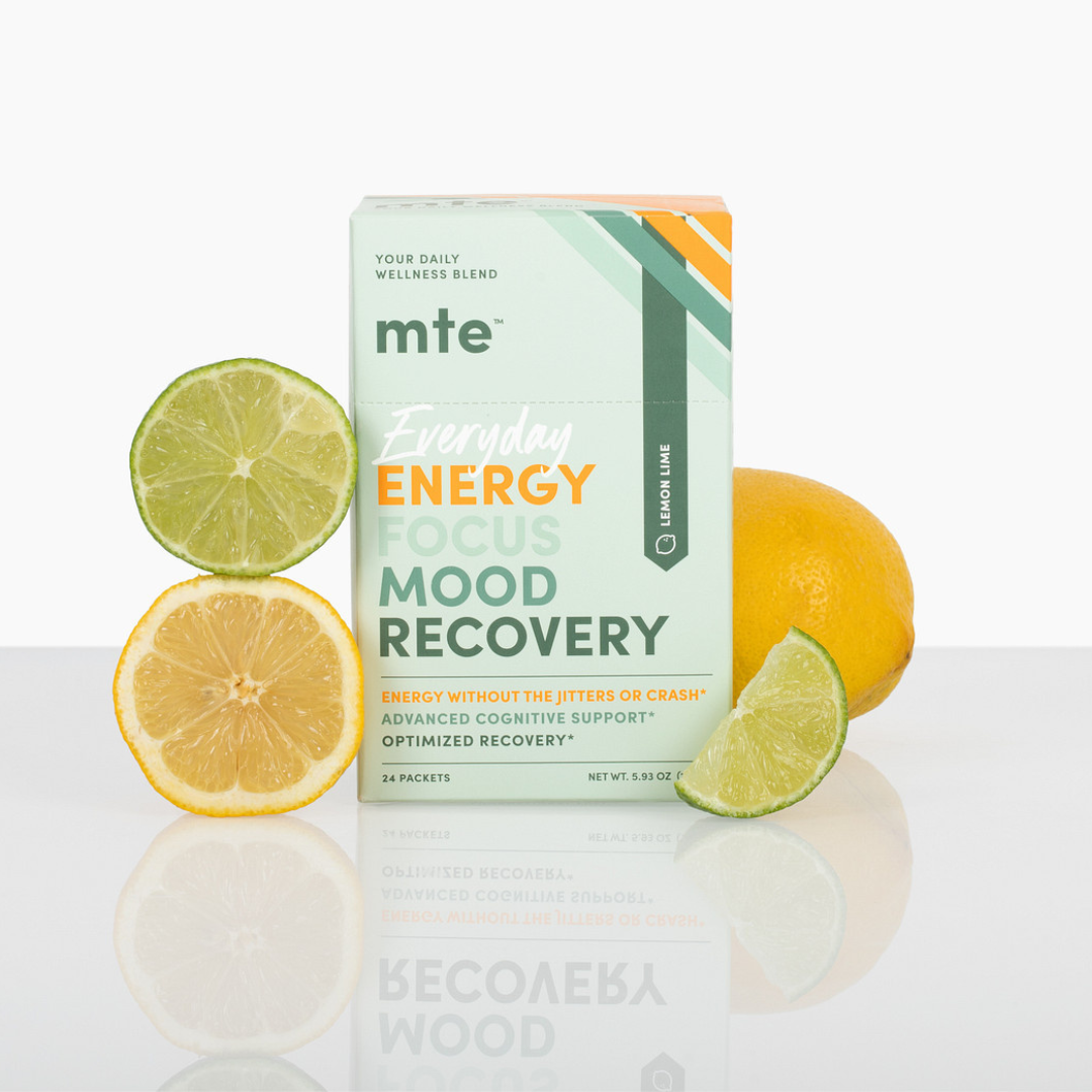 MTE Energy Plus Mood Recovery supplement box with lemons and limes on a reflective surface