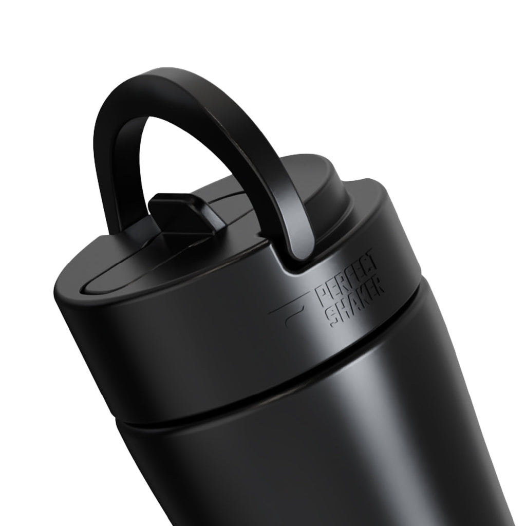 Black shaker bottle with a lid on a white background