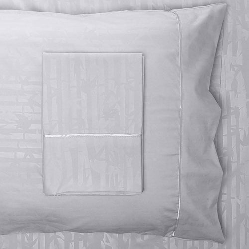 Gray pillow with a subtle pattern on a matching gray background 4-Piece Set: Super-Soft 1600 Series Bamboo Embossed Bed Sheet