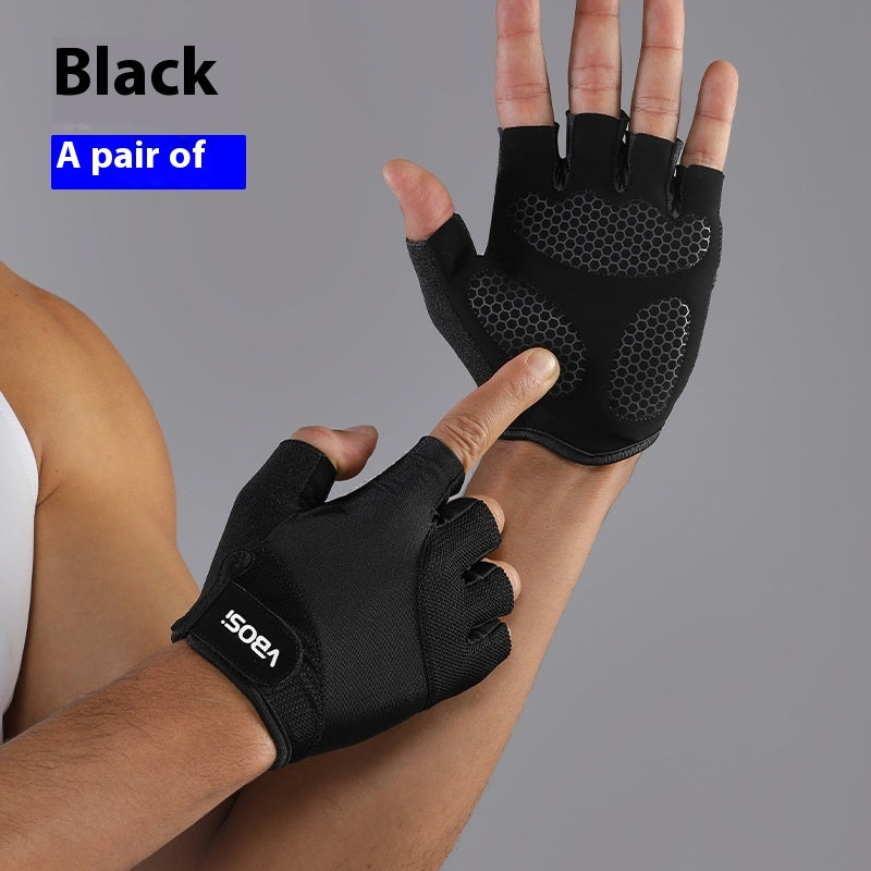 Black gloves with fingerless design and honeycomb pattern on a gray background