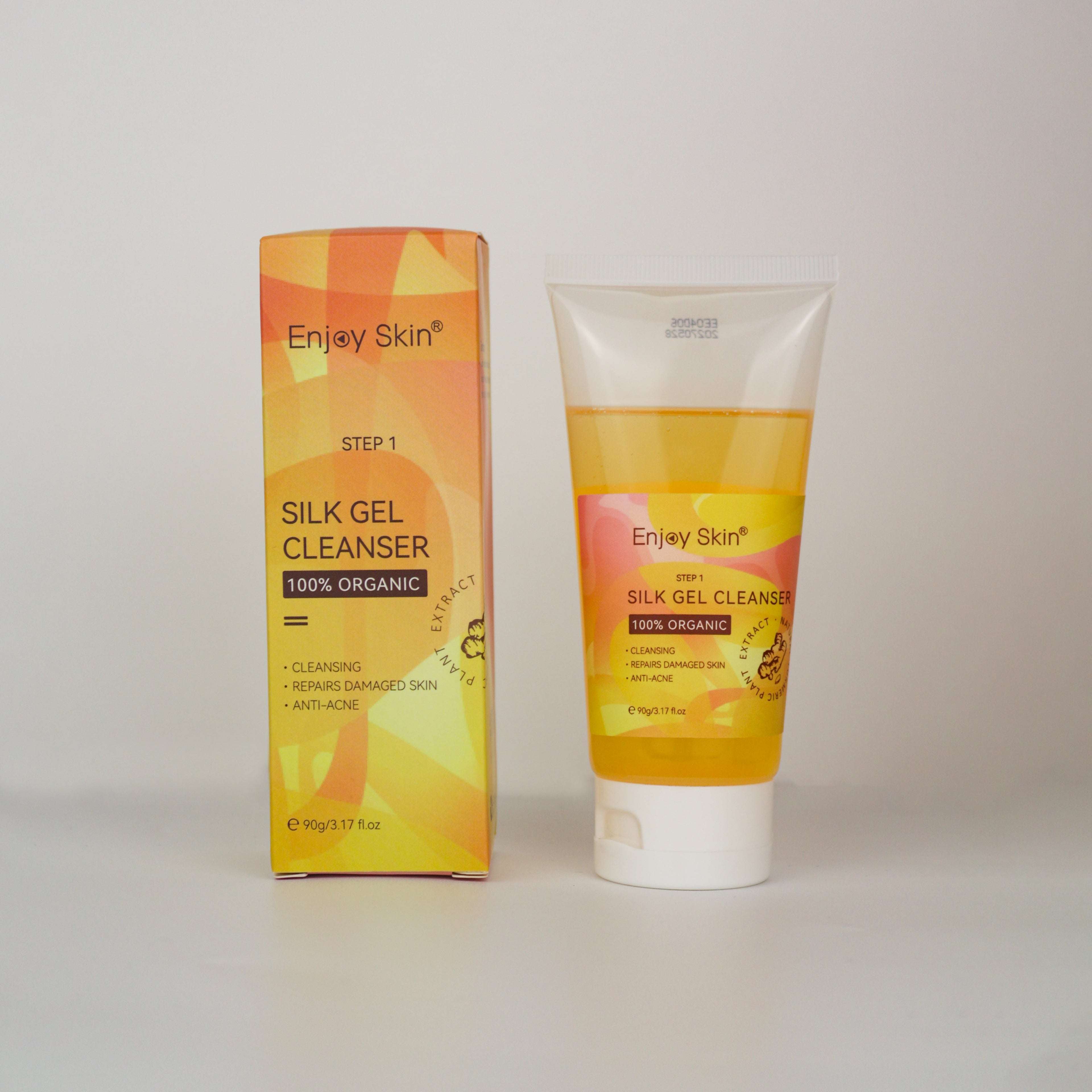 Enjoy Skin Silk Gel Cleanser tube and packaging displayed on a light gray background, part of the 5-Piece Organic Vegan Turmeric Skincare Set for anti-acne care, brightening, hydration, and healthier-looking skin.