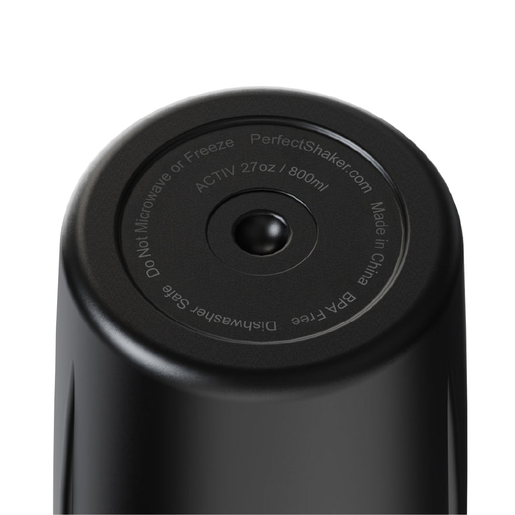 Close-up of the top circular lid of a black PerfectShaker bottle, showing printed text including 'ACTIV 2Tz / 800ml' and 'Made in China' on a white background.