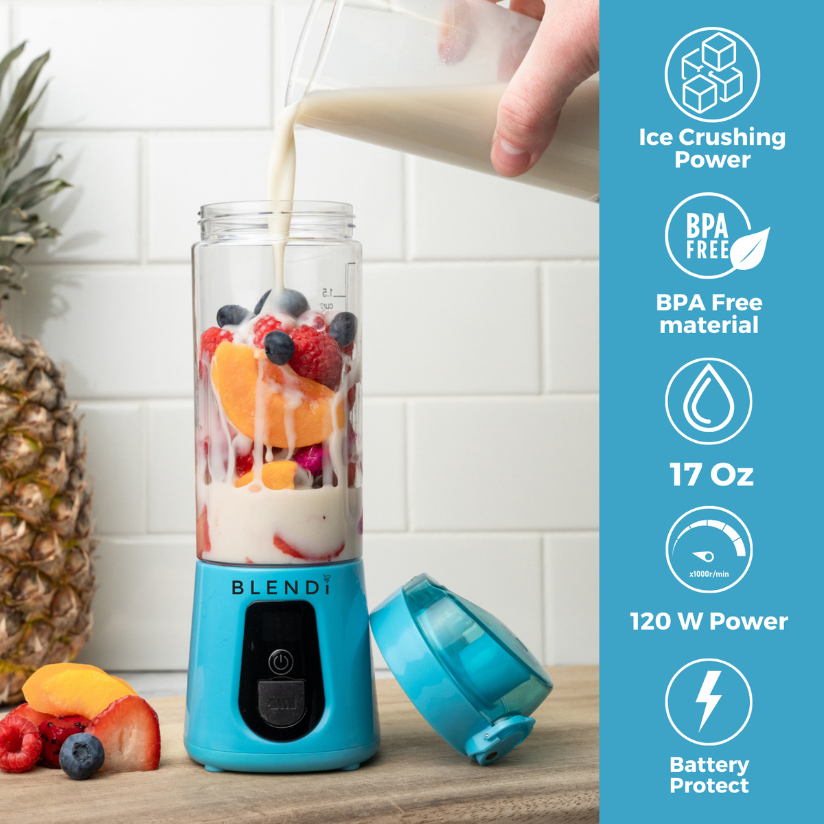 Pro+ 17oz portable ice-crushing blender blending a fruit smoothie, featuring 120W power, BPA-free material and battery protection.