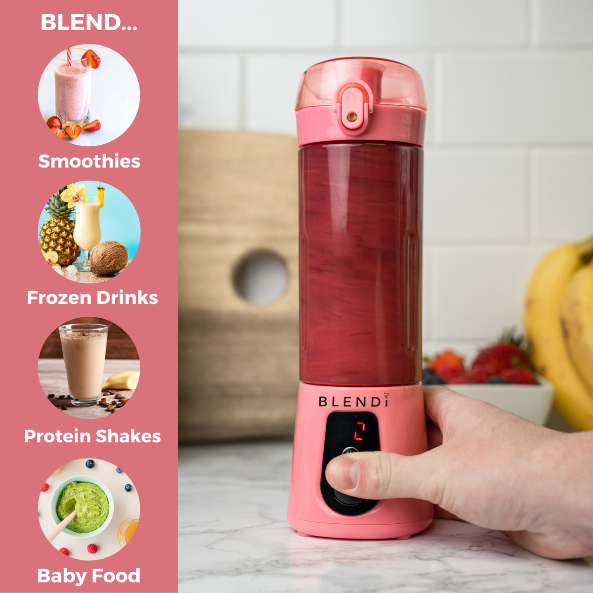 Pink Pro+ 17oz portable ice-crushing blender for smoothies, frozen drinks, protein shakes and baby food, shown with fruit on a kitchen counter.