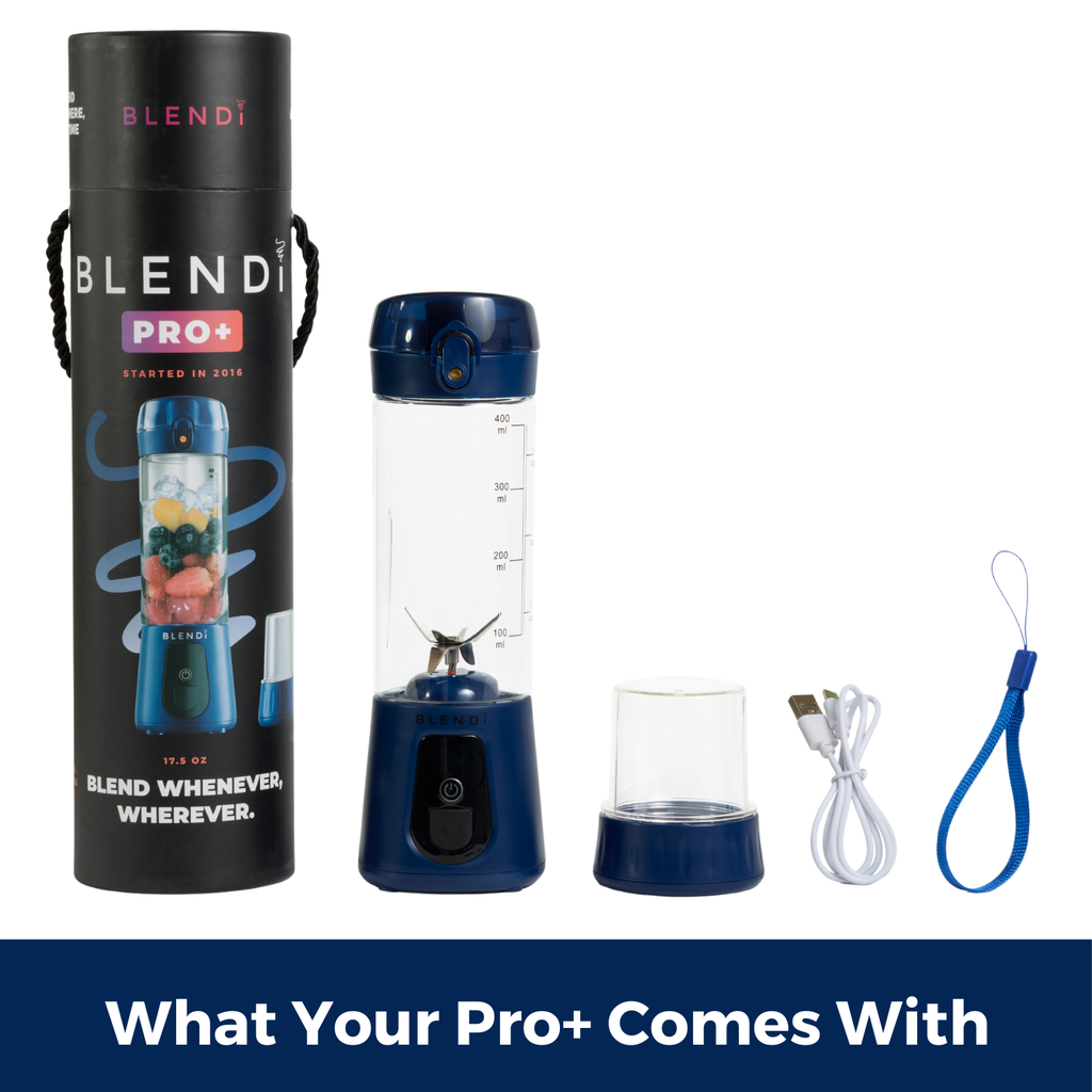 BLENDi Pro+ 17oz portable ice-crushing blender with travel cup, storage lid, USB charging cable, wrist strap and packaging in navy blue.