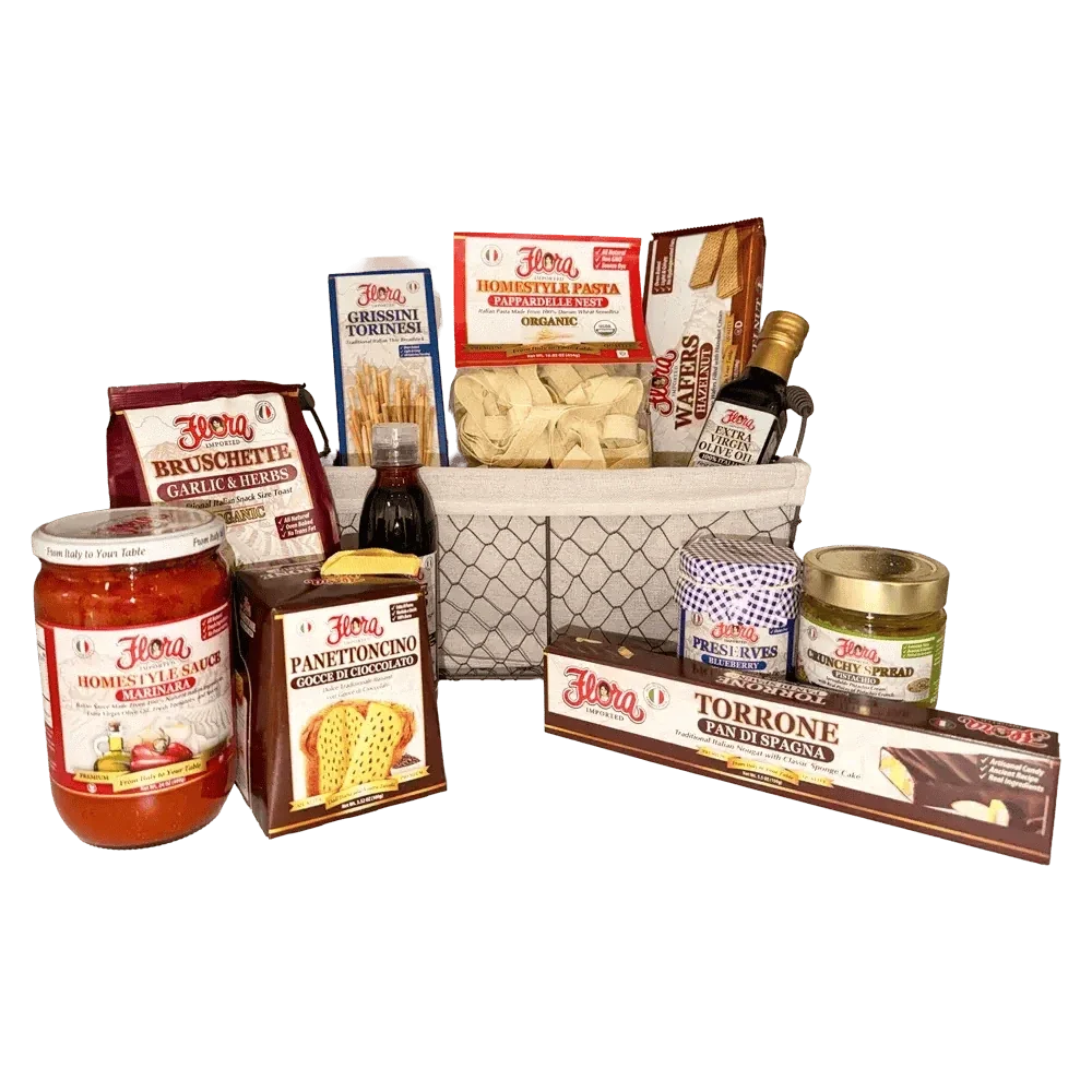 Premium Italian gourmet gift basket featuring organic pasta, marinara sauce, breadsticks, bruschetta mix, olive oil, crackers, preserves, sweet biscotti, torrone nougat, and gourmet spreads in a decorative wire basket.