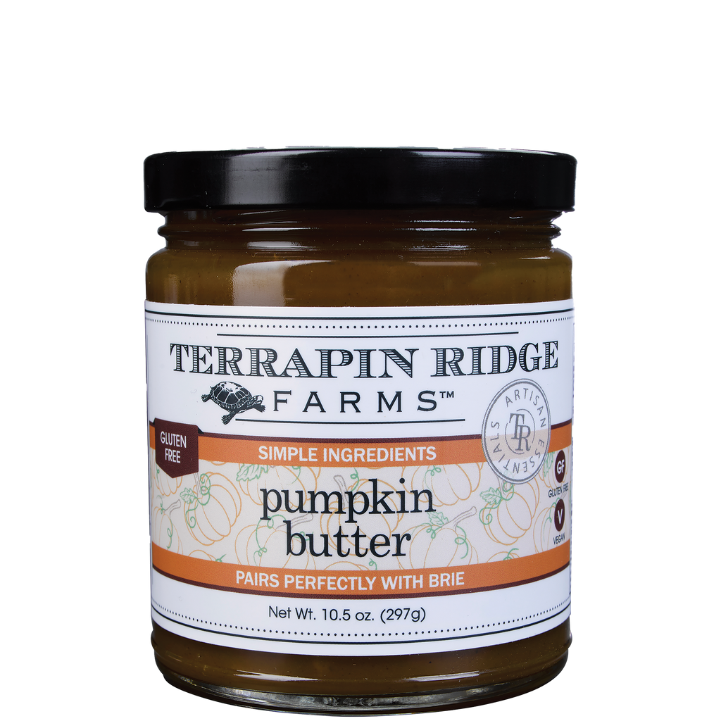 Terrapin Ridge Farms Pumpkin Butter in a glass jar with black lid, gluten-free pumpkin spread made with simple ingredients, isolated on a transparent background.