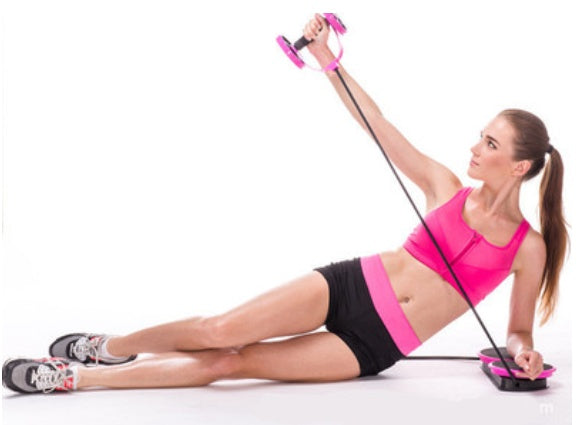 Woman exercising with a pink resistance band on a white background