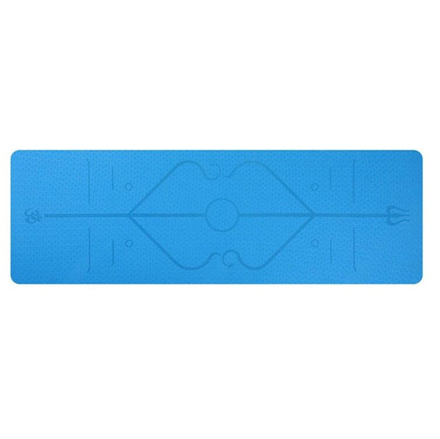 Blue yoga mat with a geometric design on a white background
