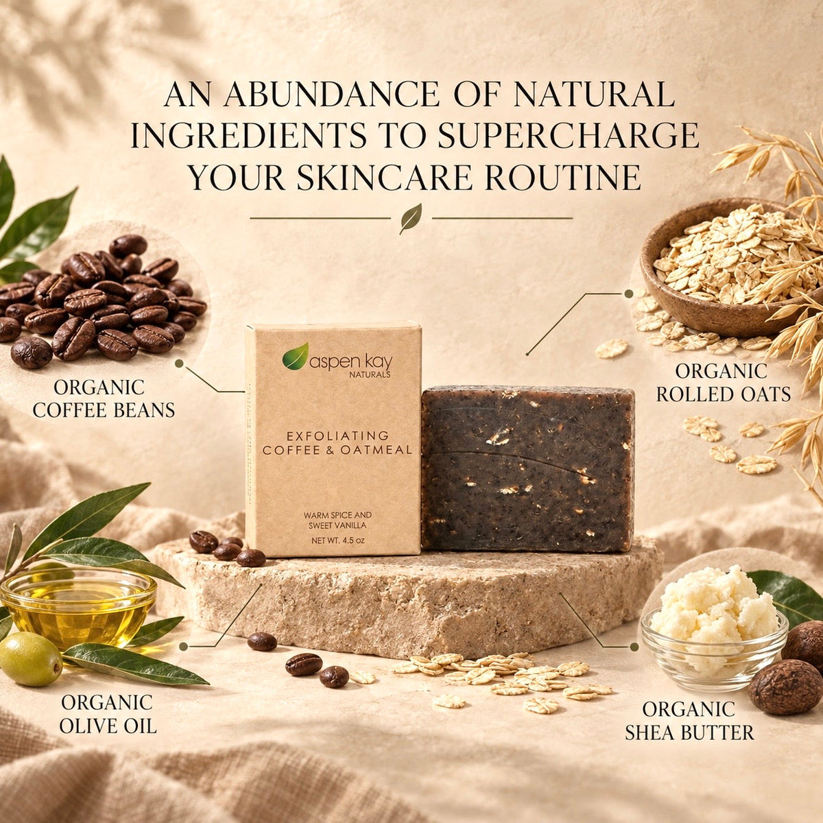 Aspen Kay Naturals Exfoliating Coffee & Oatmeal skincare bar shown with its kraft paper box on a stone slab, surrounded by labeled natural ingredients including coffee beans, oats, olive oil, and shea butter on a warm beige background.