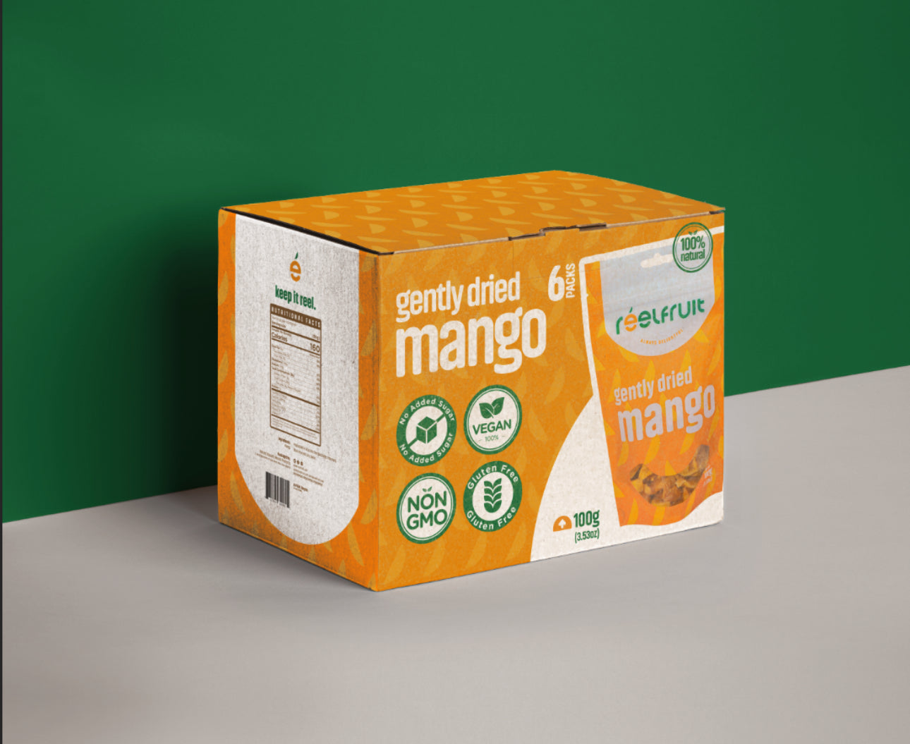 Box of 'Gently Dried Mango' by Eelfruit on a green and gray background