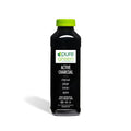Bottle of pure green Active Charcoal drink on a white background. Pure Green COLD Pressed Juice. Ingredients include: Activated Charcoal, Ginger, Lemon and Agave. Kosher, NON-GMO and Gluten Free Juice Drink.