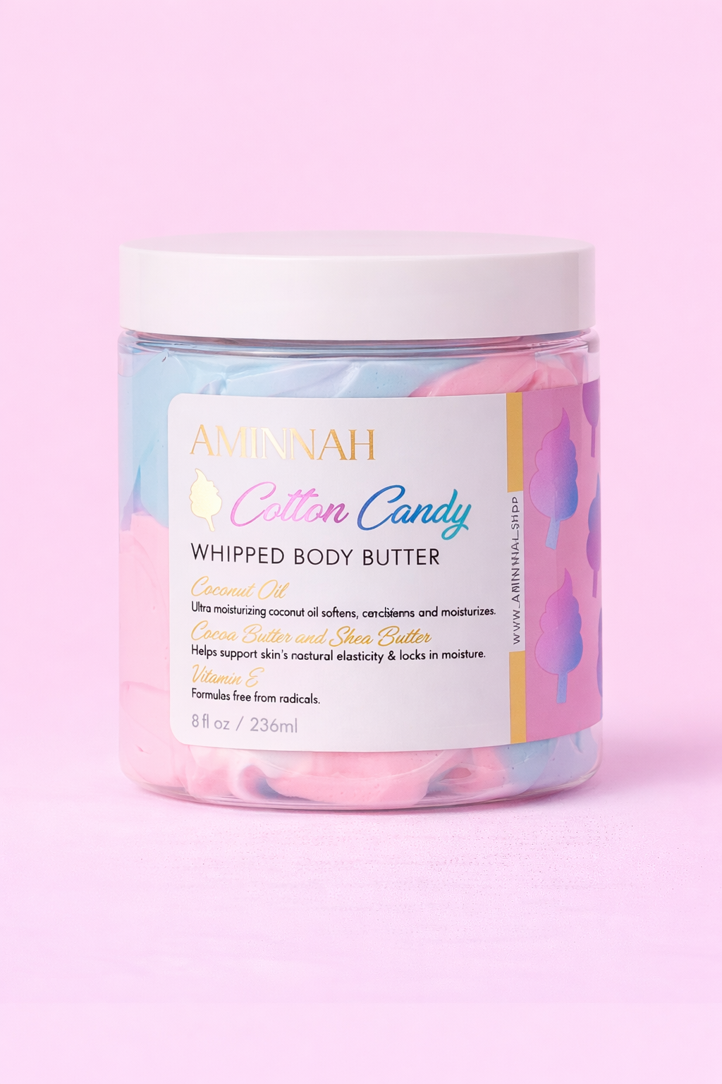 AMINNAH Cotton Candy Whipped Body Butter with rich whipped texture in pastel pink and blue. Luxurious clean beauty moisturizer made with natural ingredients, vegan, cruelty-free, paraben-free, and gluten-free formula. Crafted by a female-owned brand using recyclable packaging for soft, deeply nourished, healthy-looking skin.