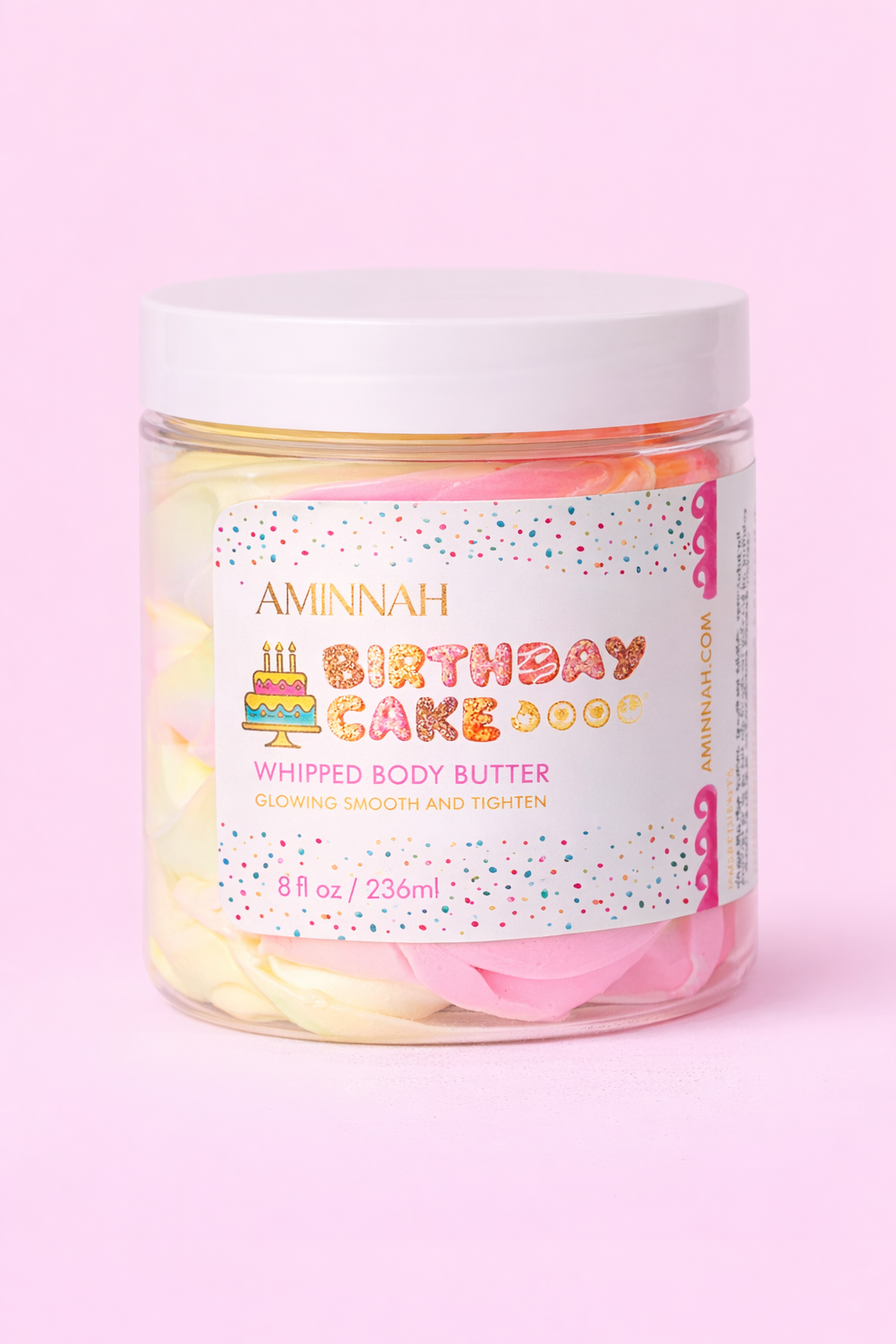 AMINNAH Birthday Cake Whipped Body Butter in 8 oz jar with pink and white whipped cream texture, moisturizing shea butter body moisturizer made with natural ingredients. Clean Beauty, cruelty-free, vegan, female-owned brand skincare proudly made in the USA, available at Tree of Life Grocers.