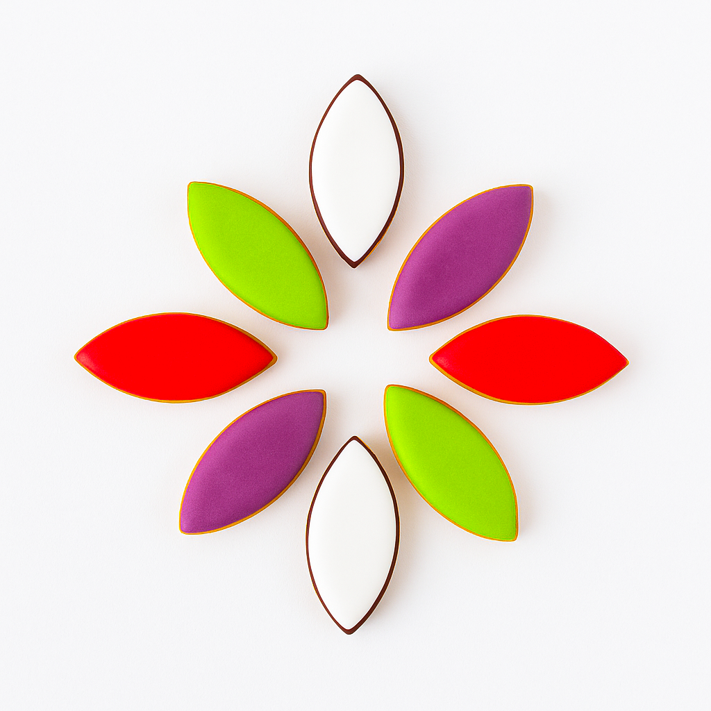 Colorful leaf-shaped cookies arranged in a circular pattern on a white background