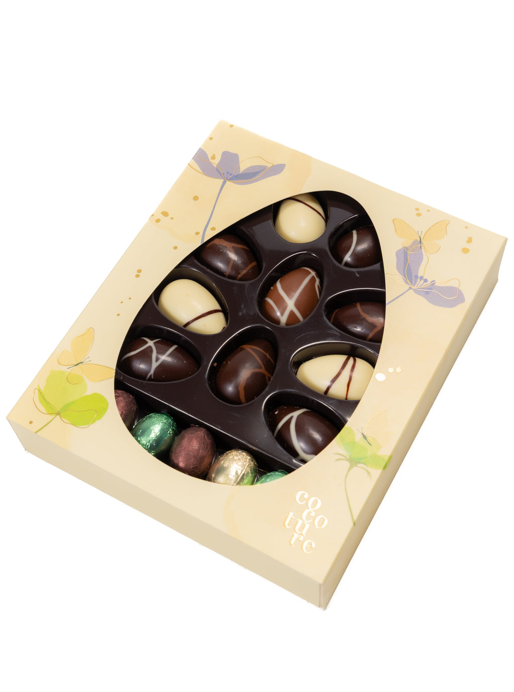 Box of assorted chocolates with a decorative lid on a white background